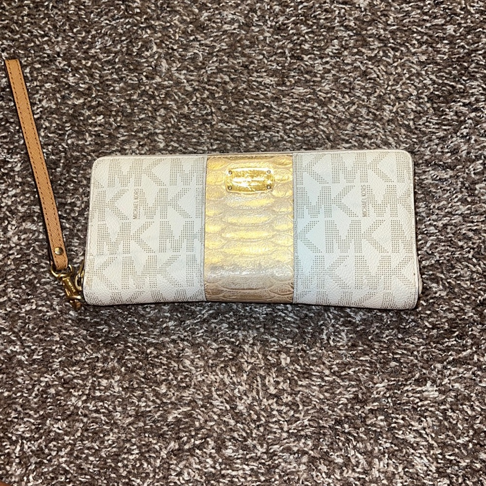Authentic Michael Kors wallet with wristlet. Gold and cream.